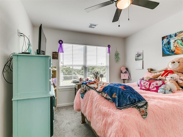 11712 Muirfield Ln, Guthrie, OK 73044 - bedroom with light carpet, multiple windows, and a ceiling fan