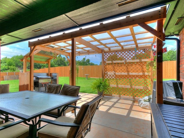 11712 Muirfield Ln, Guthrie, OK 73044 - fenced backyard featuring outdoor dining space, a patio area, a pergola, and grilling area