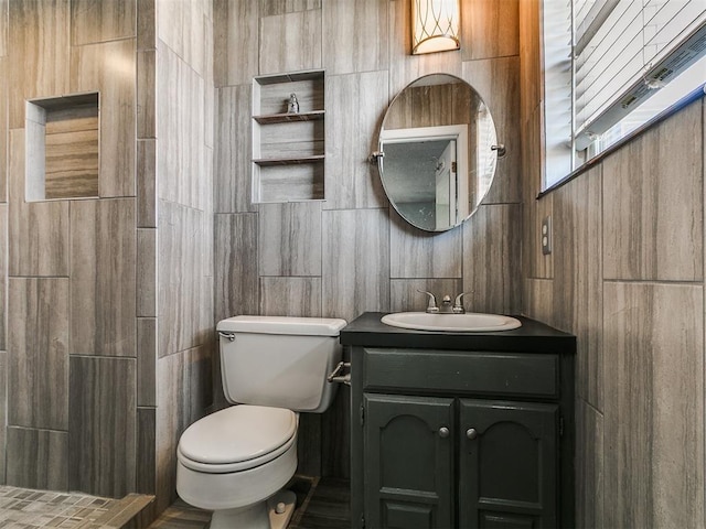 201 S Patterson Dr, Moore, OK 73160 - bathroom featuring vanity and tile walls