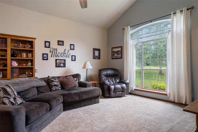 1748 Logans Run, Chandler, OK 74834 - carpeted living room featuring vaulted ceiling, plenty of natural light, and a ceiling fan