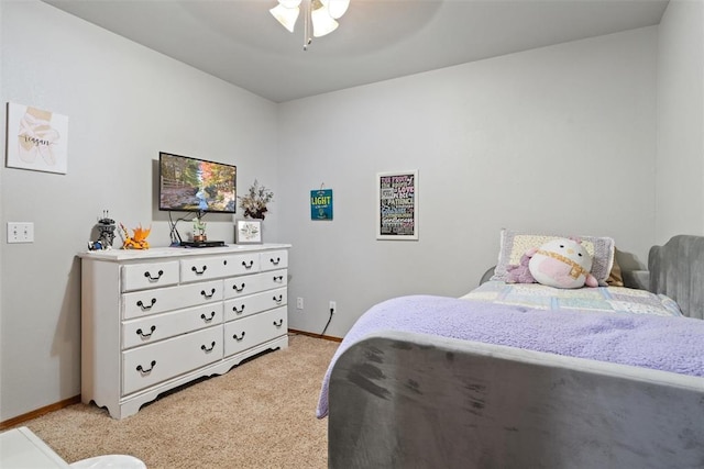 1748 Logans Run, Chandler, OK 74834 - bedroom with light carpet and a ceiling fan
