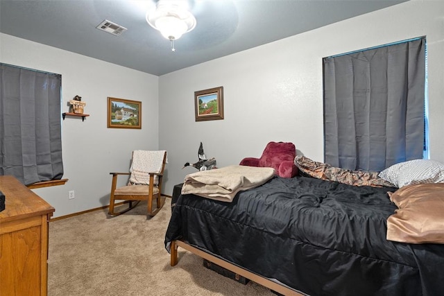 1748 Logans Run, Chandler, OK 74834 - bedroom with light colored carpet and baseboards