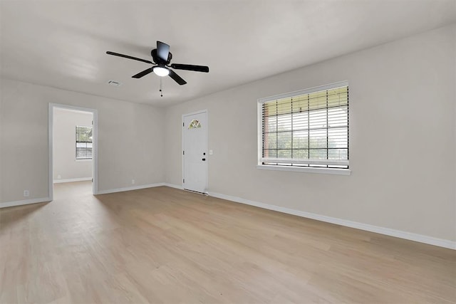 1712 N 4th St, Sayre, OK 73662 - empty room featuring light wood-type flooring and a ceiling fan