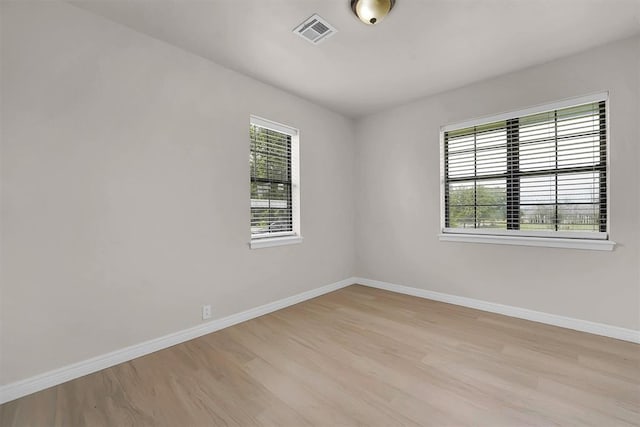 1712 N 4th St, Sayre, OK 73662 - empty room with light wood finished floors