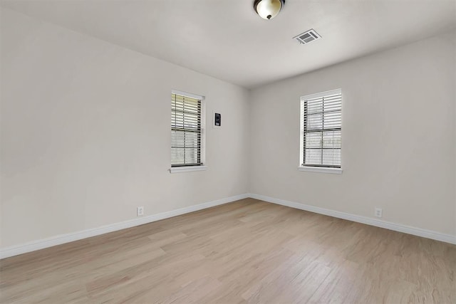1712 N 4th St, Sayre, OK 73662 - spare room with light wood-style floors and baseboards