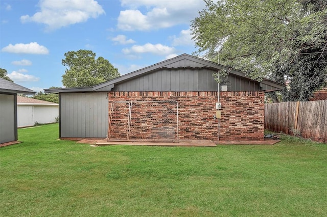 1712 N 4th St, Sayre, OK 73662 - view of home's exterior featuring brick siding