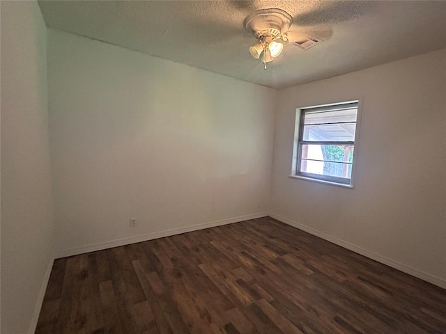 1708 W Modelle Ave, Clinton, OK 73601 - empty room with dark wood-style floors and a ceiling fan