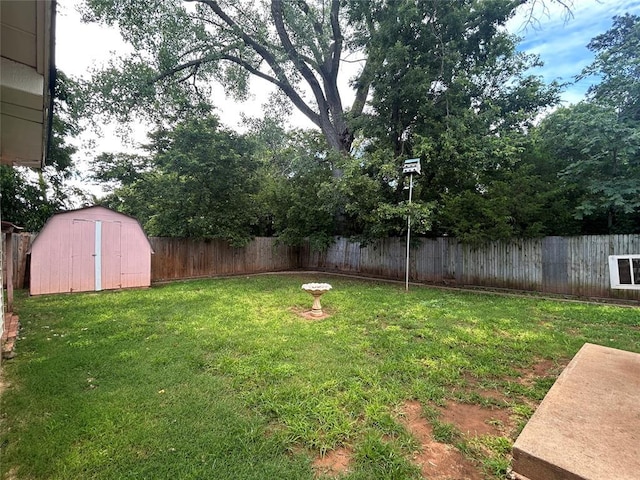 1708 W Modelle Ave, Clinton, OK 73601 - fenced backyard with a storage unit