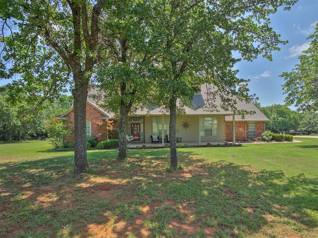 1810 Sandpiper Dr, Blanchard, OK 73010 - view of front of home featuring a front yard and brick siding