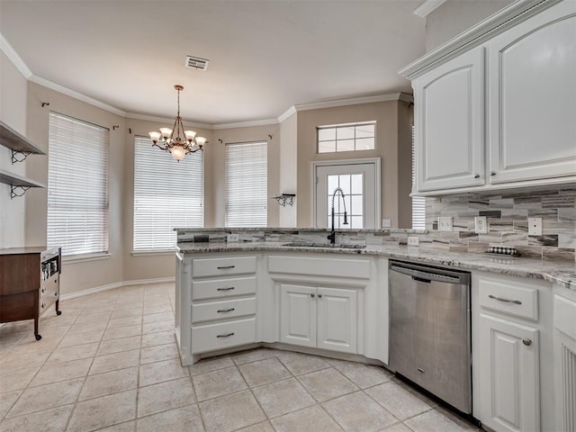 1810 Sandpiper Dr, Blanchard, OK 73010 - kitchen featuring stainless steel dishwasher, a chandelier, open shelves, a peninsula, and white cabinets