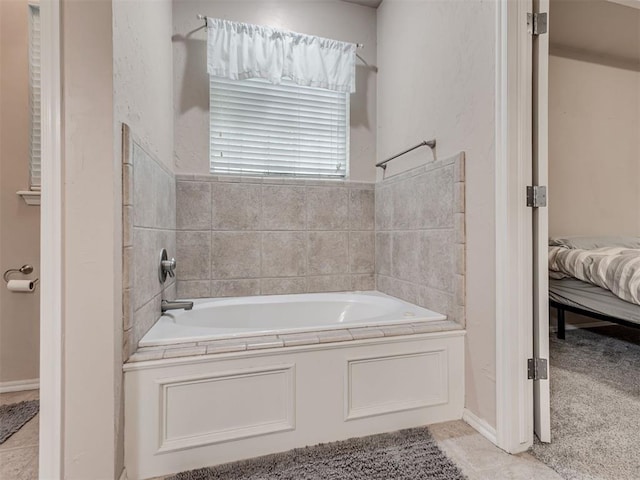 1810 Sandpiper Dr, Blanchard, OK 73010 - bathroom featuring a garden tub and ensuite bathroom