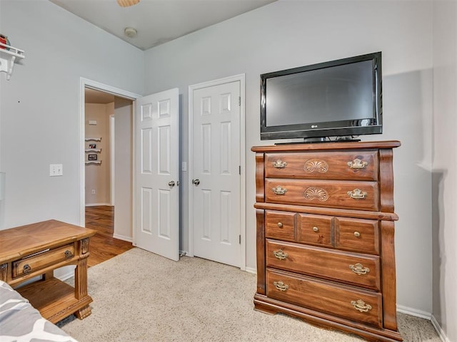 1810 Sandpiper Dr, Blanchard, OK 73010 - bedroom featuring light colored carpet and baseboards