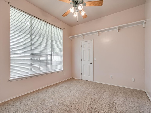 1810 Sandpiper Dr, Blanchard, OK 73010 - unfurnished room with ceiling fan, carpet, and healthy amount of natural light