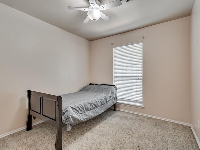 1810 Sandpiper Dr, Blanchard, OK 73010 - carpeted bedroom with multiple windows and a ceiling fan