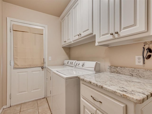 1810 Sandpiper Dr, Blanchard, OK 73010 - laundry area featuring cabinet space, separate washer and dryer, and light tile patterned flooring