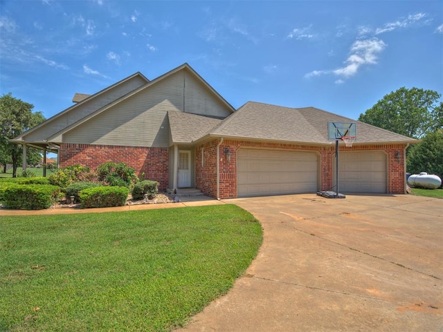 1810 Sandpiper Dr, Blanchard, OK 73010 - view of front of property featuring a garage, a front yard, brick siding, concrete driveway, and roof with shingles