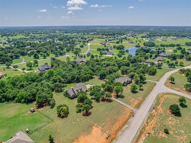 1810 Sandpiper Dr, Blanchard, OK 73010 - aerial overview of property's location featuring a large body of water and a tree filled landscape