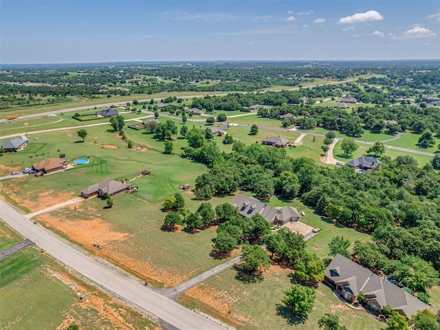 1810 Sandpiper Dr, Blanchard, OK 73010 - aerial view of property and surrounding area with a tree filled landscape
