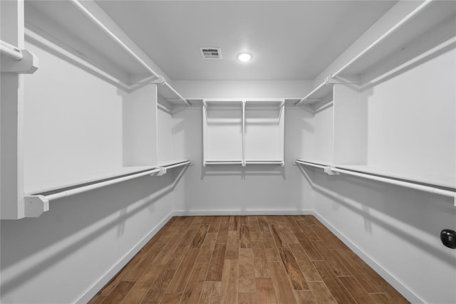 2326 County Road 1335, Blanchard, OK 73010 - spacious closet with dark wood-style flooring