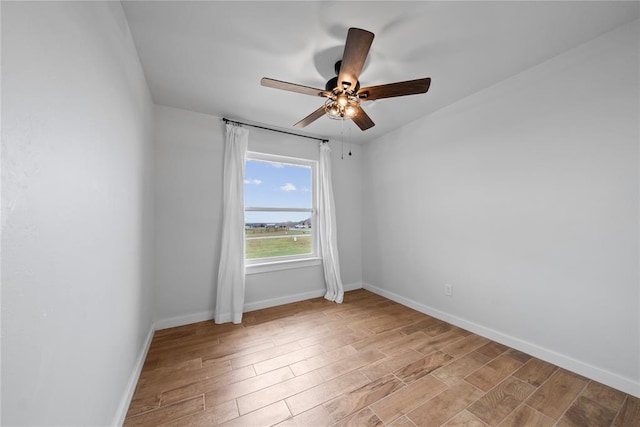 2326 County Road 1335, Blanchard, OK 73010 - unfurnished room featuring light wood-style flooring and a ceiling fan