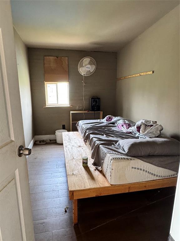 17871 E 1200th Rd, Erick, OK 73645 - bedroom with hardwood / wood-style flooring