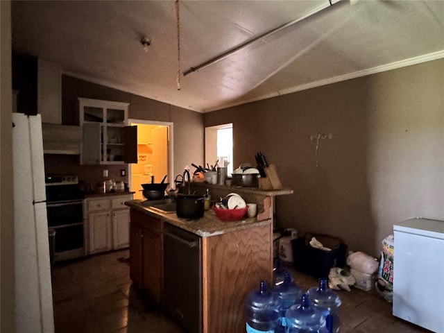 17871 E 1200th Rd, Erick, OK 73645 - kitchen featuring range, dishwasher, fridge, wall chimney range hood, and freestanding refrigerator