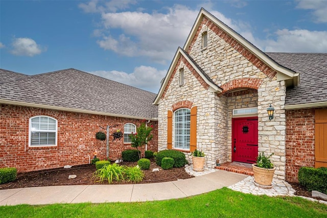 1865 Buckskin Ct, Blanchard, OK 73010 - french provincial home with roof with shingles, stone siding, and brick siding