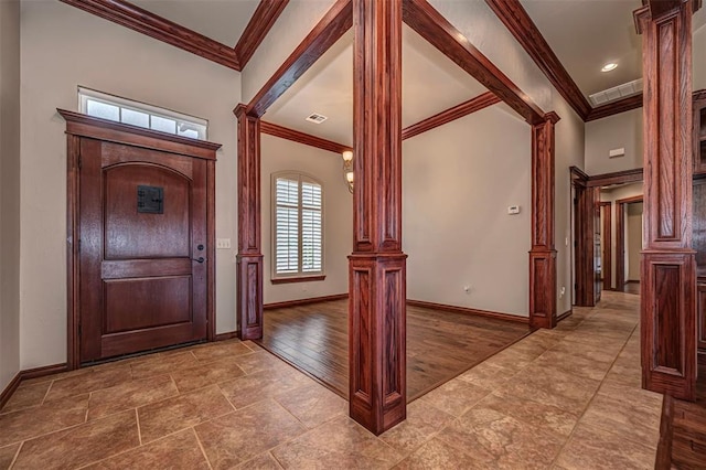 1865 Buckskin Ct, Blanchard, OK 73010 - foyer with ornate columns and ornamental molding