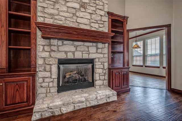 1865 Buckskin Ct, Blanchard, OK 73010 - detailed view of wood finished floors and a fireplace