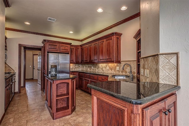 1865 Buckskin Ct, Blanchard, OK 73010 - kitchen with stainless steel fridge with ice dispenser, crown molding, open shelves, a center island, and recessed lighting