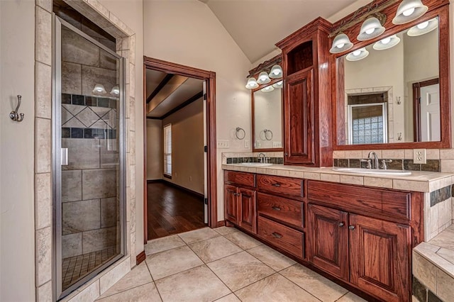 1865 Buckskin Ct, Blanchard, OK 73010 - full bath featuring lofted ceiling, double vanity, a shower stall, and tile patterned floors