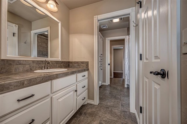 1865 Buckskin Ct, Blanchard, OK 73010 - bathroom with vanity and tile patterned flooring
