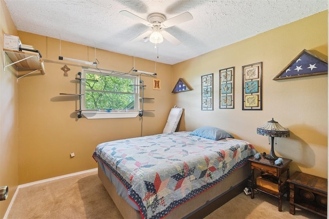 349760 E 970th Rd, Sparks, OK 74869 - carpeted bedroom with a textured ceiling and ceiling fan