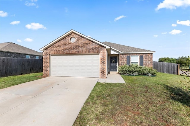 11501 Ruger Rd, Yukon, OK 73099 - ranch-style house with brick siding, an attached garage, and driveway