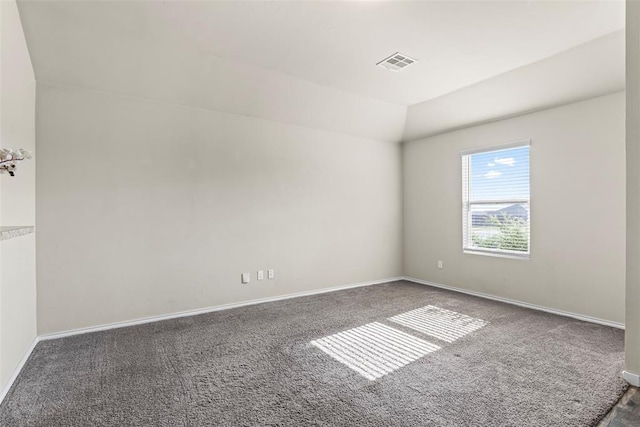 11501 Ruger Rd, Yukon, OK 73099 - unfurnished room with carpet flooring and vaulted ceiling