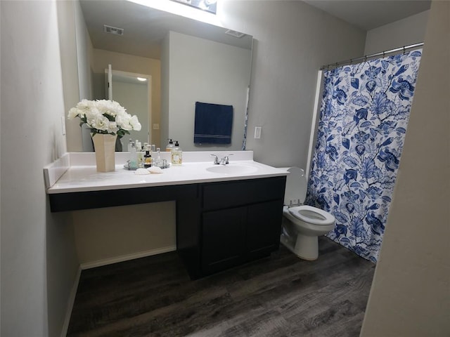 11501 Ruger Rd, Yukon, OK 73099 - bathroom featuring wood finished floors, vanity, and a shower with curtain