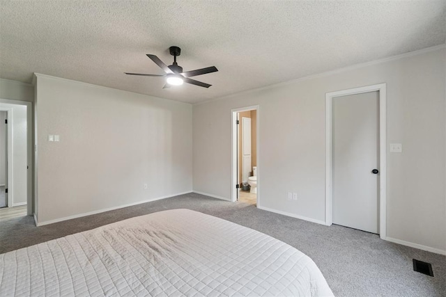 12073 N3540 Rd, Seminole, OK 74868 - carpeted bedroom with a textured ceiling, connected bathroom, ceiling fan, and crown molding