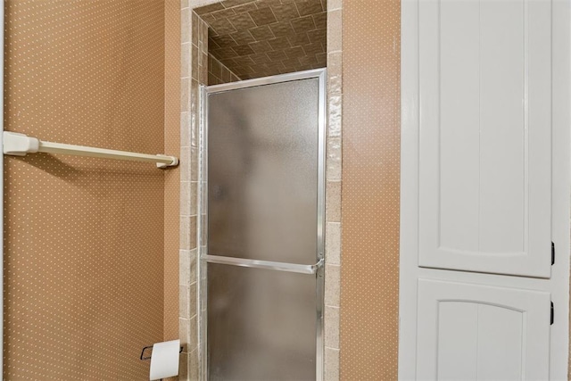 12073 N3540 Rd, Seminole, OK 74868 - bathroom featuring a stall shower and wallpapered walls