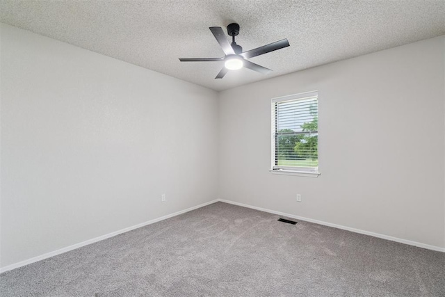 12073 N3540 Rd, Seminole, OK 74868 - carpeted spare room featuring ceiling fan and a textured ceiling
