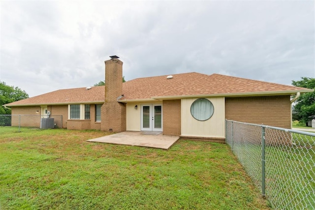 12073 N3540 Rd, Seminole, OK 74868 - rear view of house featuring french doors, a chimney, a fenced backyard, and a patio