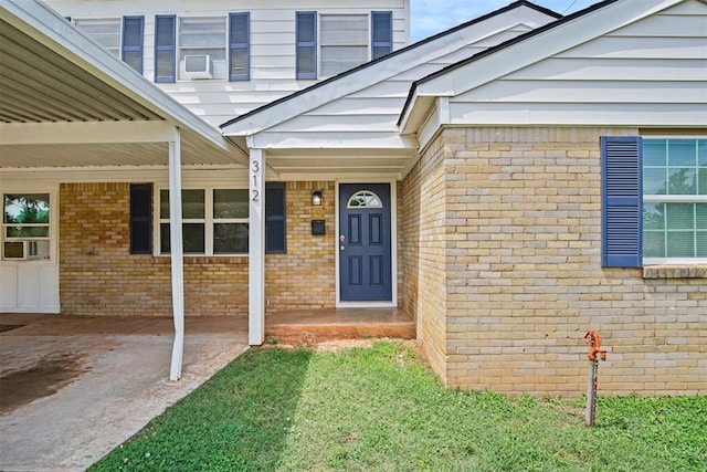 312 Jon St, Guthrie, OK 73044 - entrance to property with brick siding and cooling unit