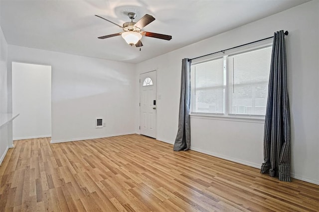 312 Jon St, Guthrie, OK 73044 - unfurnished room with light wood-style floors and ceiling fan
