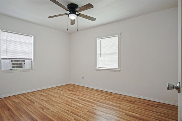 312 Jon St, Guthrie, OK 73044 - empty room featuring healthy amount of natural light, light wood-type flooring, and a ceiling fan