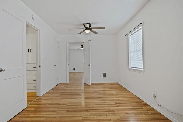 312 Jon St, Guthrie, OK 73044 - empty room featuring ceiling fan and light wood-style floors