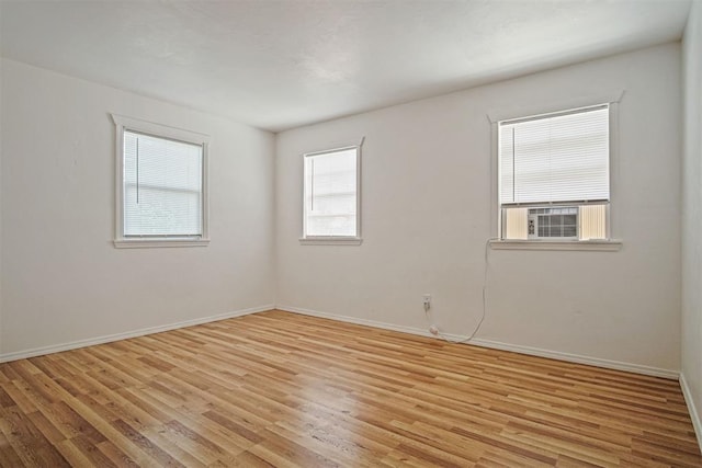 312 Jon St, Guthrie, OK 73044 - empty room featuring light wood-type flooring and baseboards