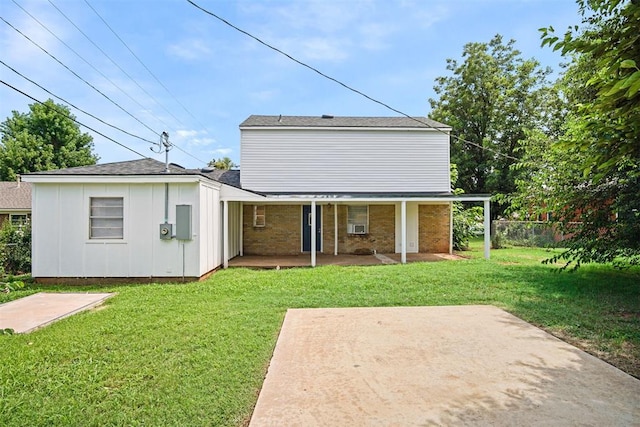 312 Jon St, Guthrie, OK 73044 - back of house with brick siding, a porch, and a patio area