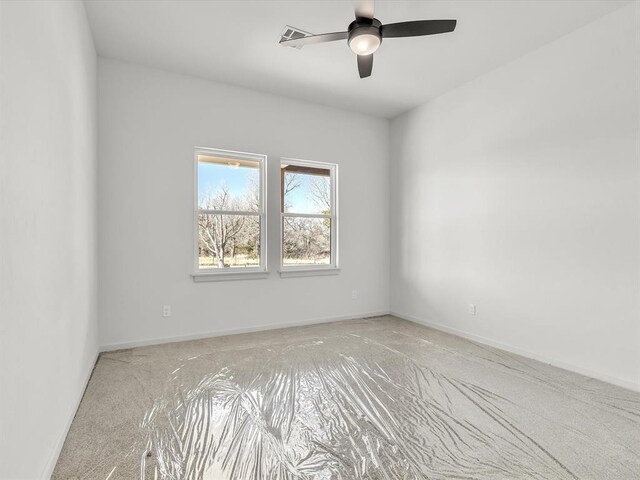 1092 S Mustang Rd, Blanchard, OK 73010 - unfurnished room featuring ceiling fan and light carpet