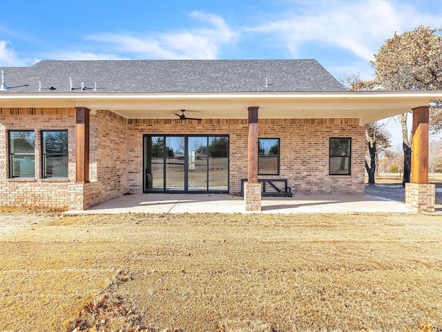 1092 S Mustang Rd, Blanchard, OK 73010 - back of property featuring a patio, brick siding, ceiling fan, and a yard