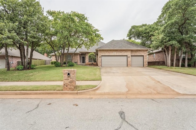 2717 Asheforde Oaks Blvd, Edmond, OK 73034 - view of front of house with brick siding, a garage, concrete driveway, a front lawn, and roof with shingles