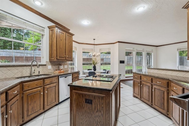 2717 Asheforde Oaks Blvd, Edmond, OK 73034 - kitchen featuring dishwasher, black electric cooktop, light tile patterned floors, decorative backsplash, and ornamental molding